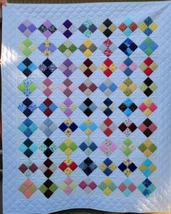 Scrappy Four Patch Quilt-image
